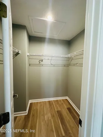 a view of a room with racks on the wall