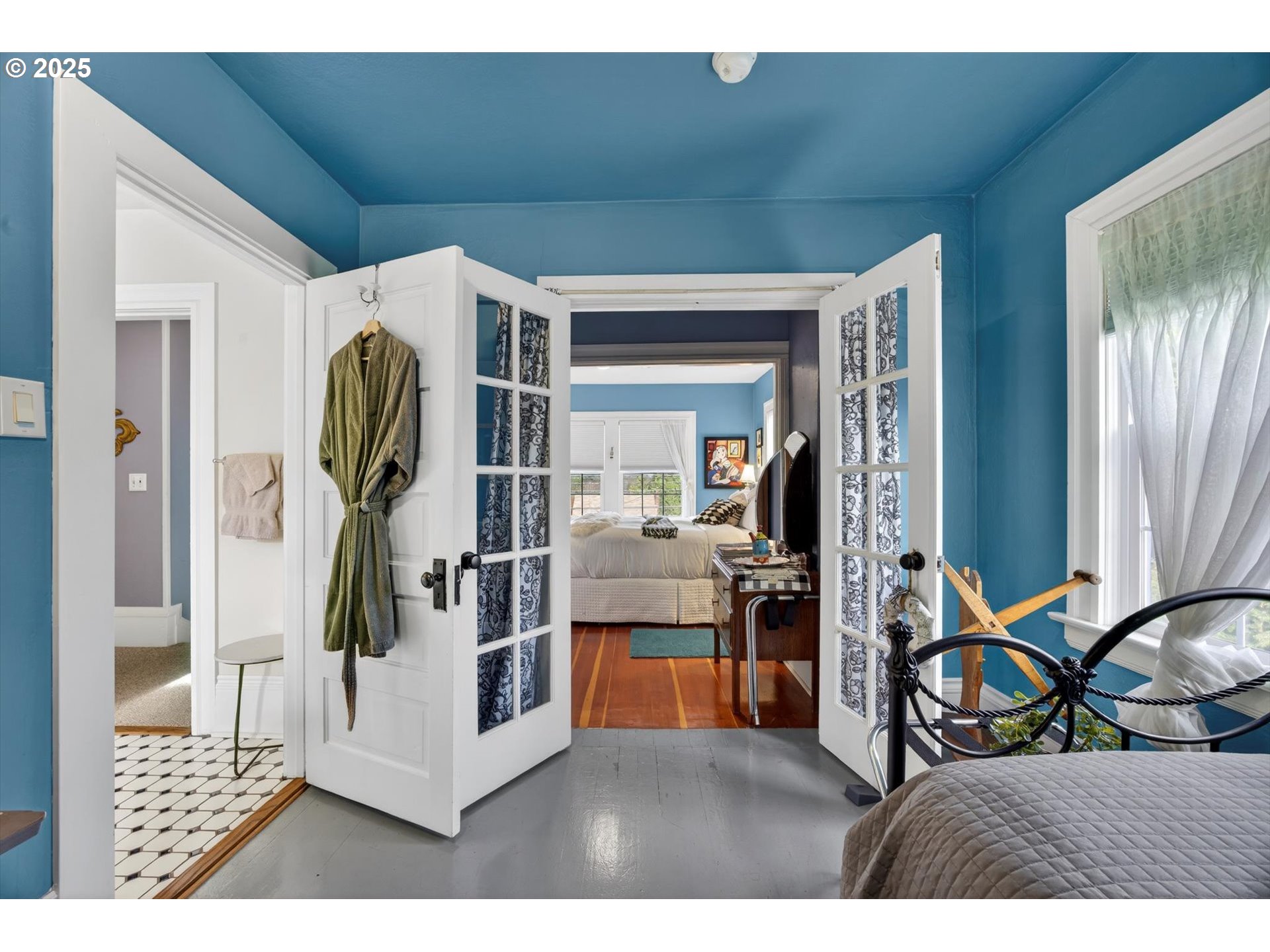 648 West Main Street Carlton, OR 97111 - Photo 32 of 48 a living room with furniture a flat screen tv and a refrigerator