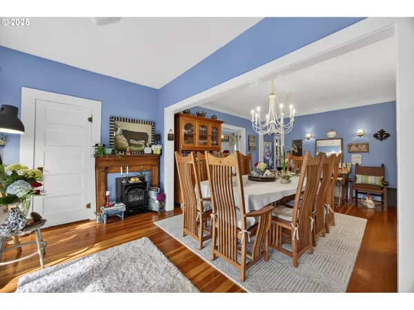 a view of a dining room with furniture and a livingroom