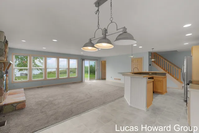 $645,000 | 11591 Wabasis Lake Drive Northeast, Greenville, MI 48838