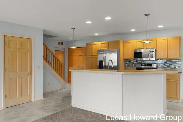 $645,000 | 11591 Wabasis Lake Drive Northeast, Greenville, MI 48838