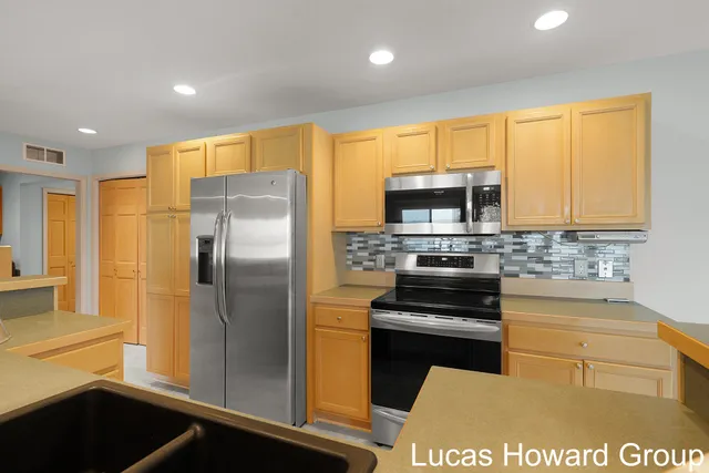 $645,000 | 11591 Wabasis Lake Drive Northeast, Greenville, MI 48838