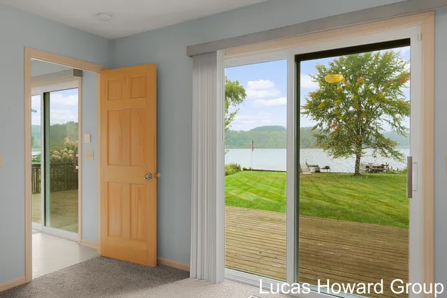 $645,000 | 11591 Wabasis Lake Drive Northeast, Greenville, MI 48838