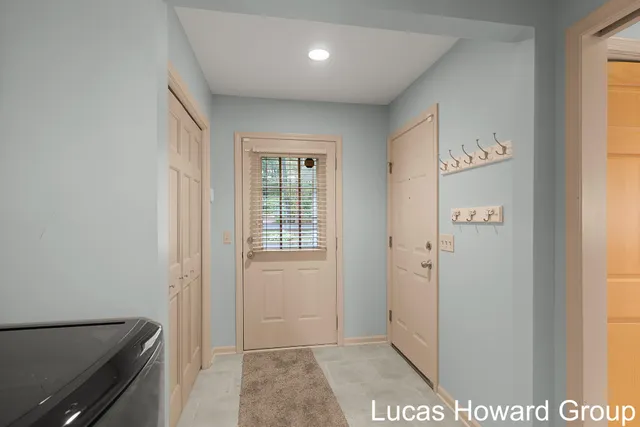 $645,000 | 11591 Wabasis Lake Drive Northeast, Greenville, MI 48838