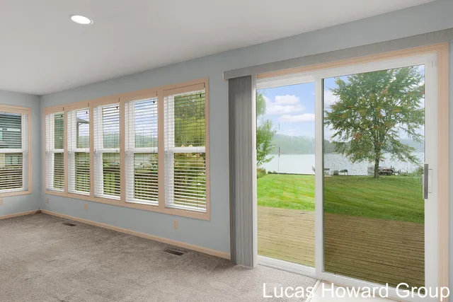 $645,000 | 11591 Wabasis Lake Drive Northeast, Greenville, MI 48838