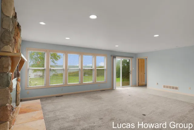 $645,000 | 11591 Wabasis Lake Drive Northeast, Greenville, MI 48838