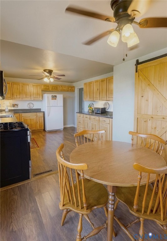 373 Chinquapin Road Prospect, VA 23960 - Photo 5 of 17 a dining table with wooden floor
