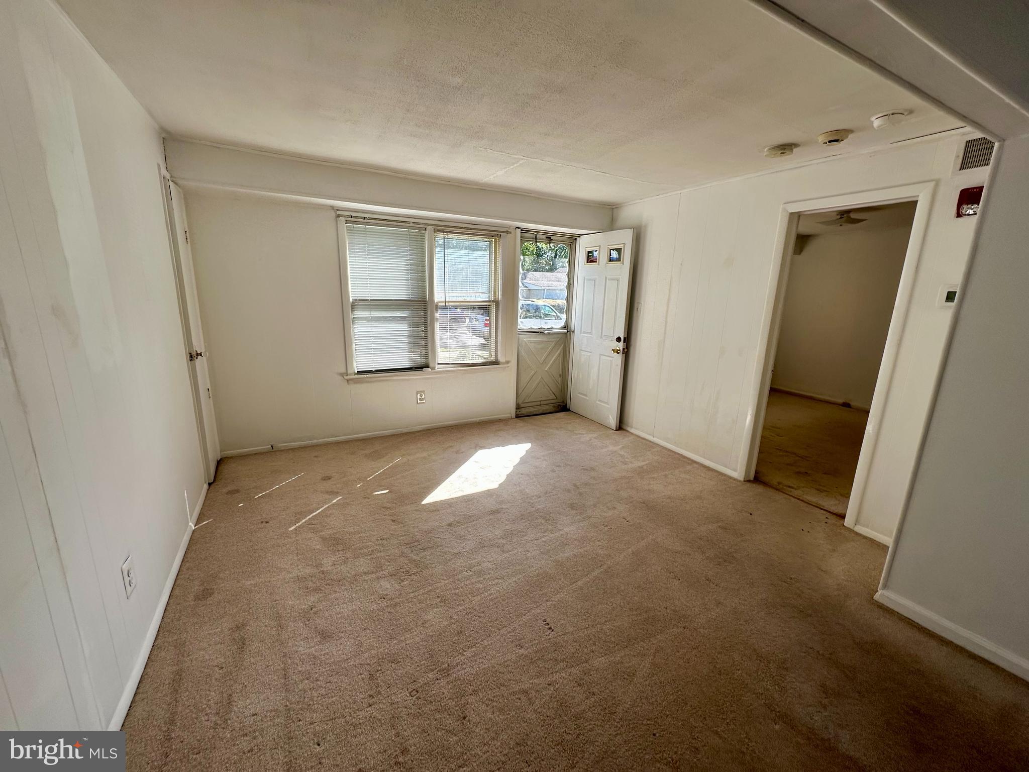 23 Vincent Avenue, Unit 1F Hamilton, NJ 08619 - Photo 5 of 10 a view of livingroom with window and hardwood floor