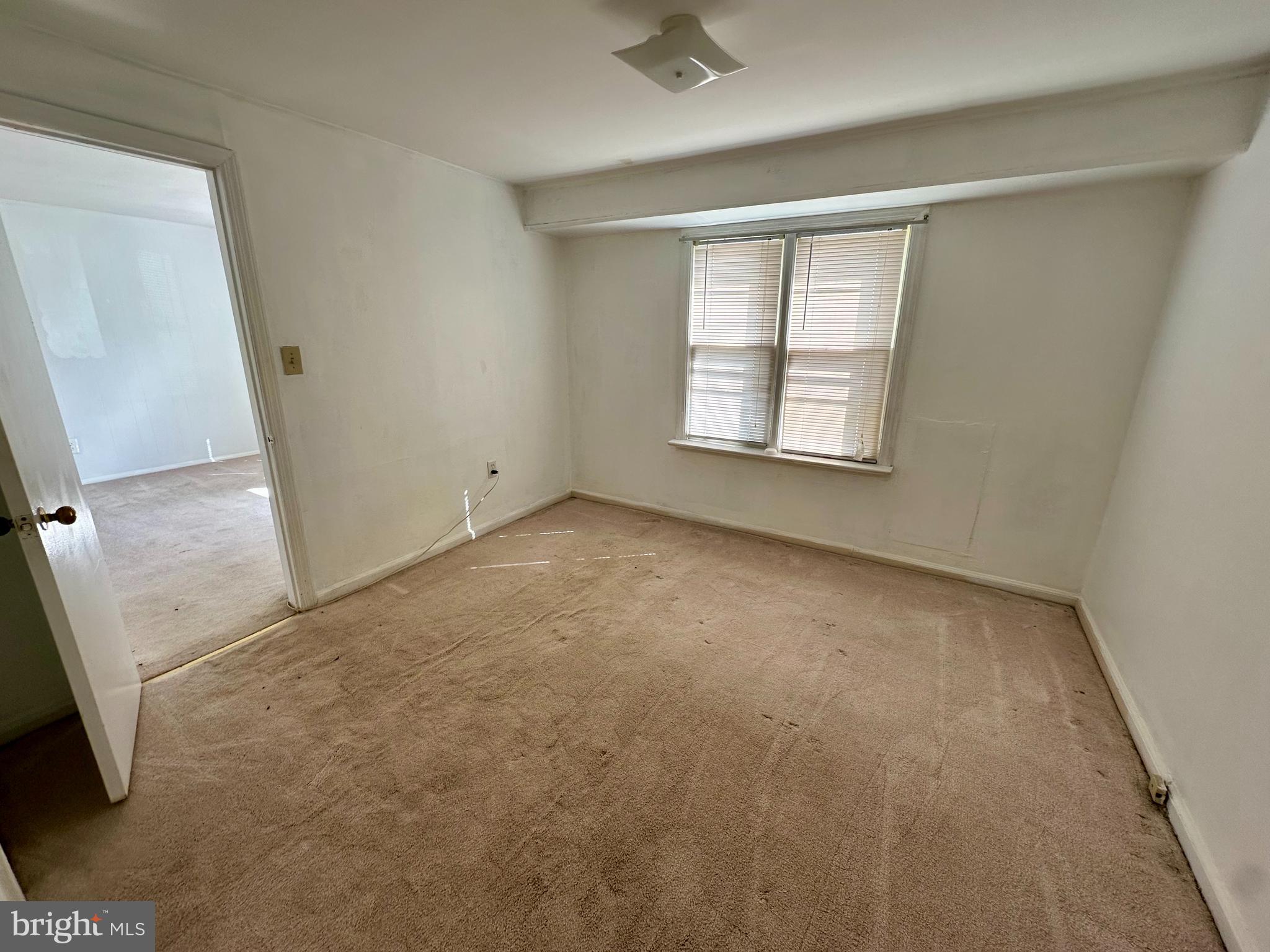 23 Vincent Avenue, Unit 1F Hamilton, NJ 08619 - Photo 10 of 10 an empty room with windows
