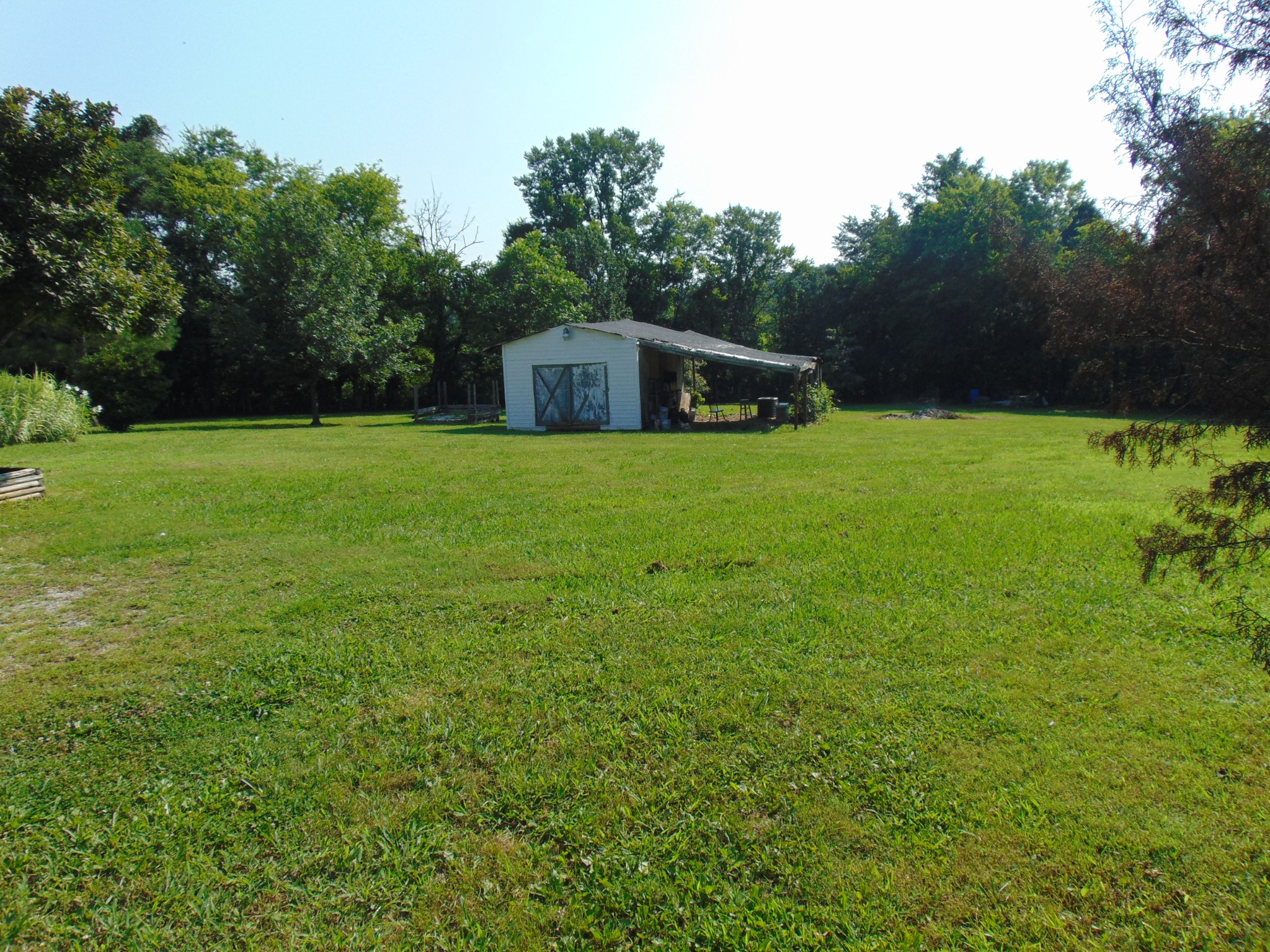 1361 Yell Road Lewisburg, TN 37091 - Photo 17 of 24 a front view of a house with a yard