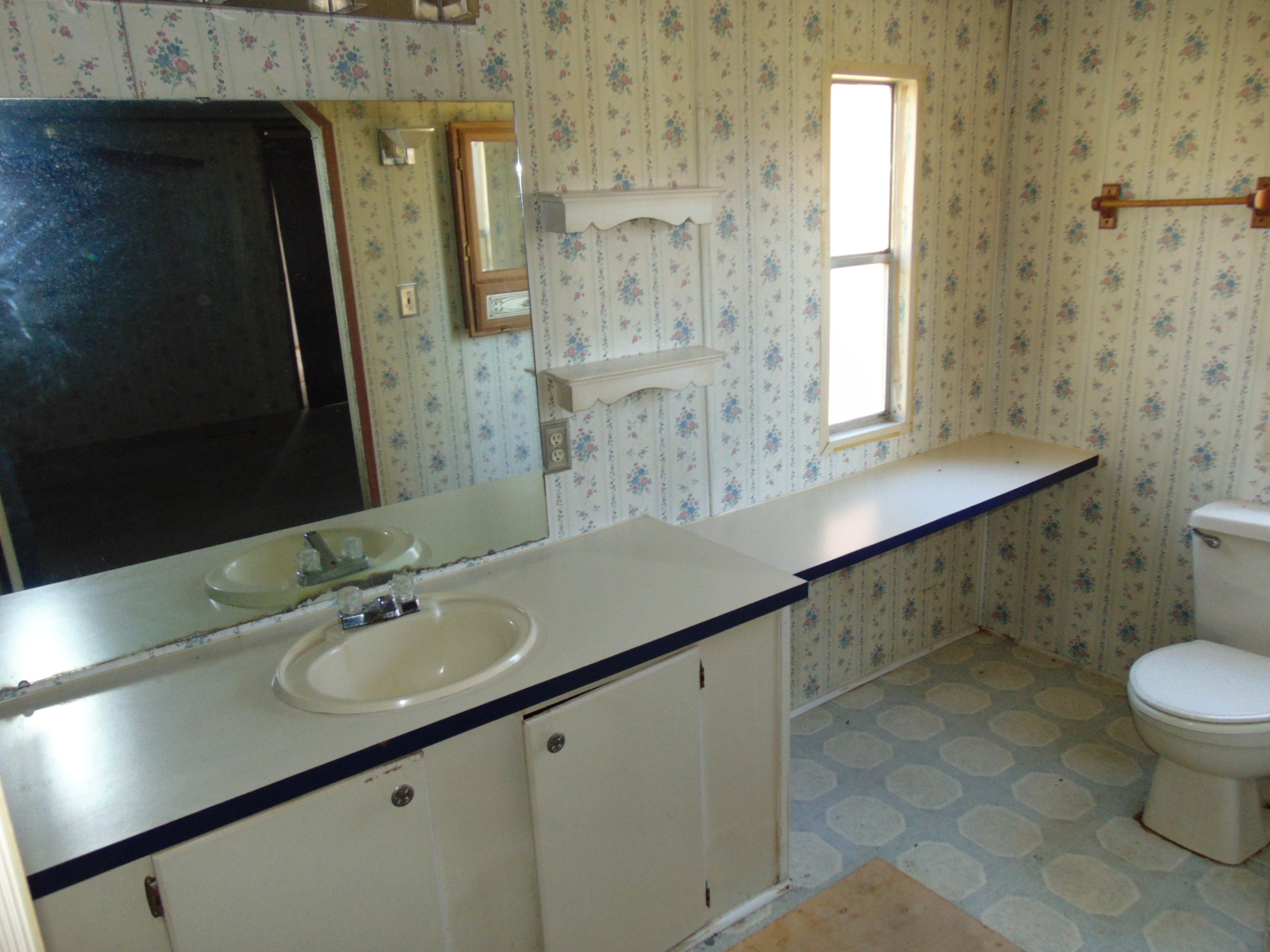 1361 Yell Road Lewisburg, TN 37091 - Photo 9 of 24 a bathroom with a double vanity sink toilet and a mirror