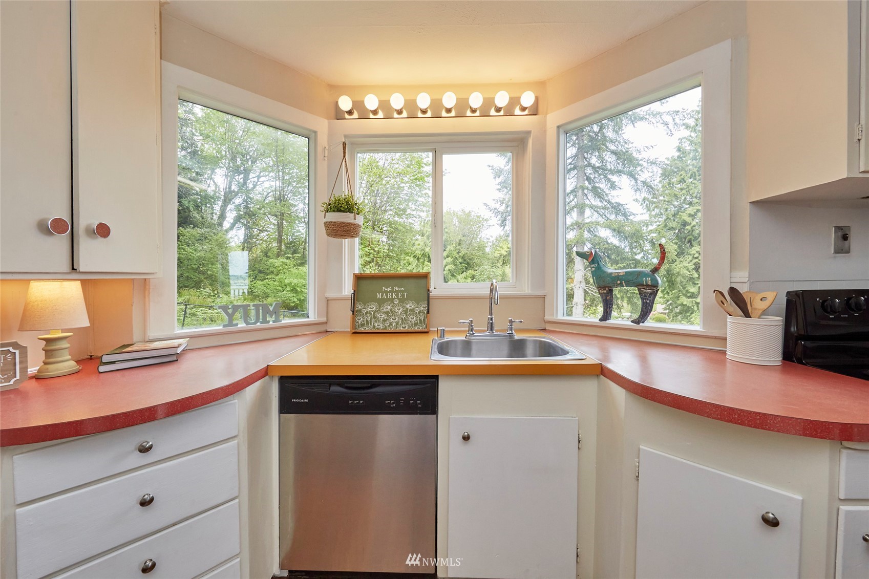 1446 Dogwood Hill Road Southwest Port Orchard, WA 98366 - Photo 14 of 31 a kitchen with a sink and large window