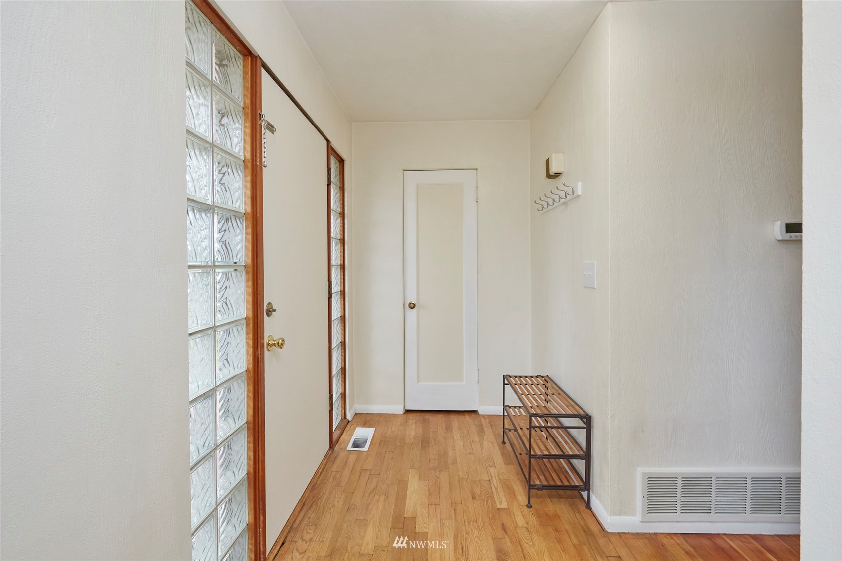 1446 Dogwood Hill Road Southwest Port Orchard, WA 98366 - Photo 22 of 31 a view of front door with wooden floor
