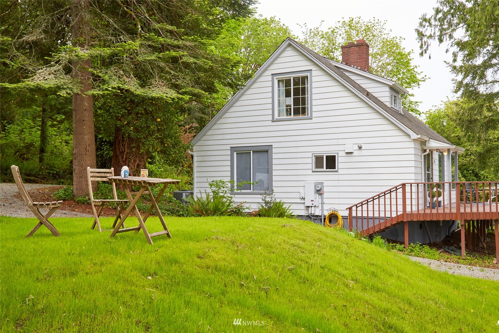 1446 Dogwood Hill Road Southwest Port Orchard, WA 98366 - Photo 5 of 31 a view of a house with a patio