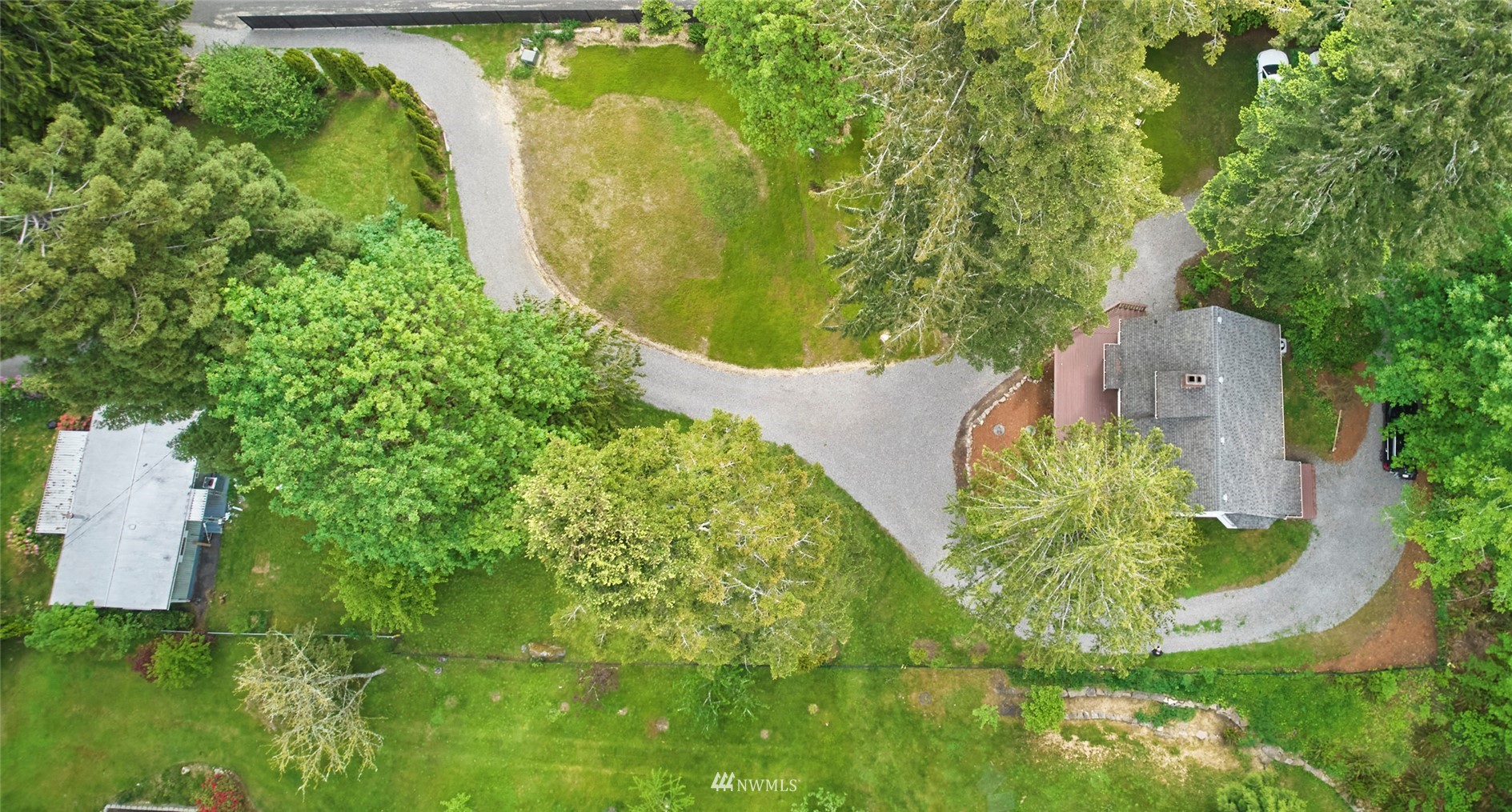 1446 Dogwood Hill Road Southwest Port Orchard, WA 98366 - Photo 6 of 31 an aerial view of a residential houses with outdoor space and trees all around