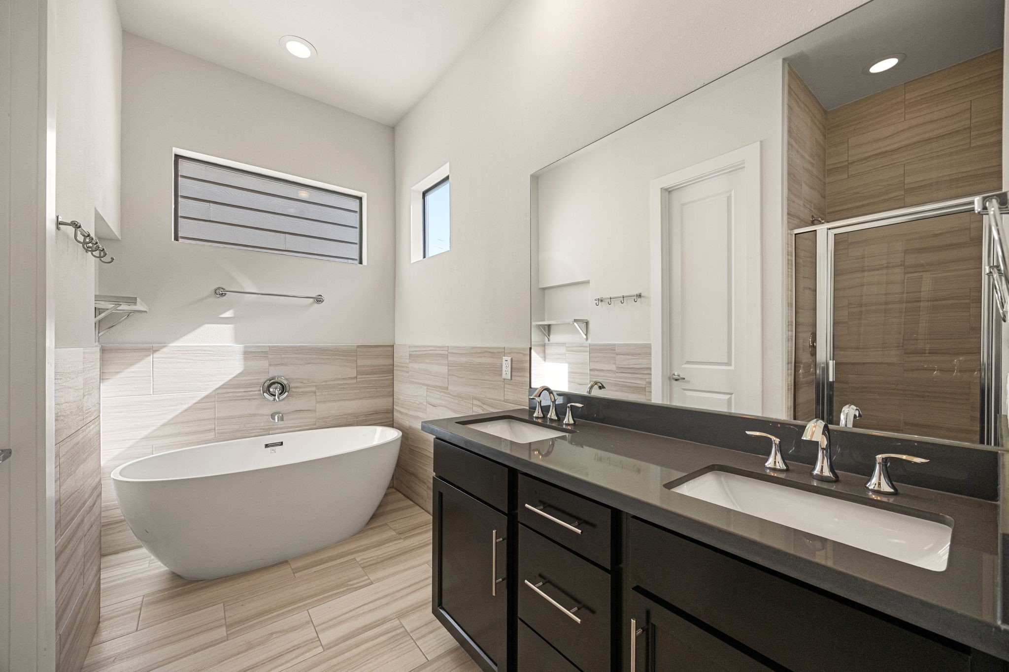 3945 Tulane Street Houston, TX 77018 - Photo 13 of 26 a bathroom with a large tub sink and mirror
