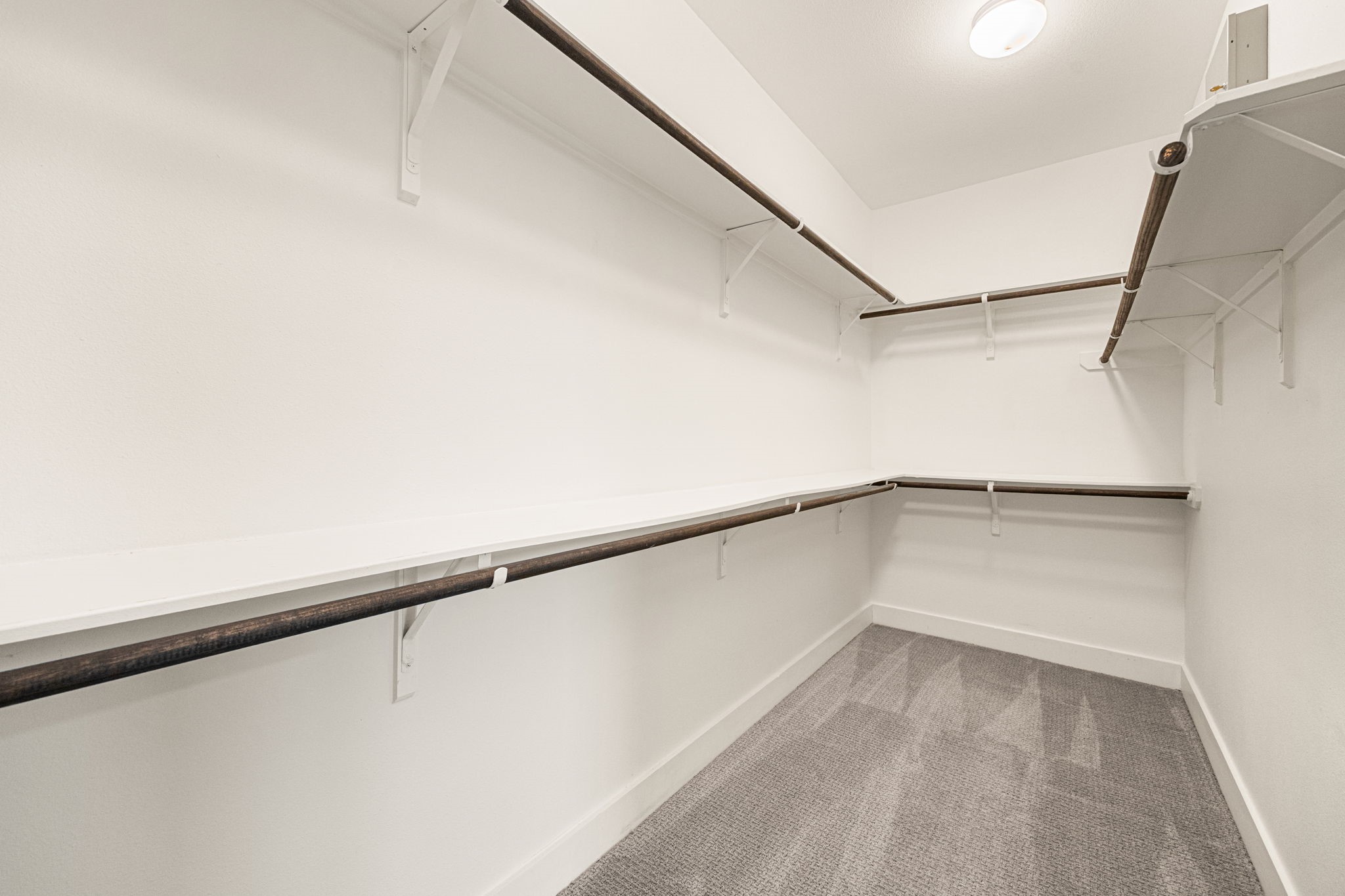 3945 Tulane Street Houston, TX 77018 - Photo 16 of 26 a view of a room with racks on the wall