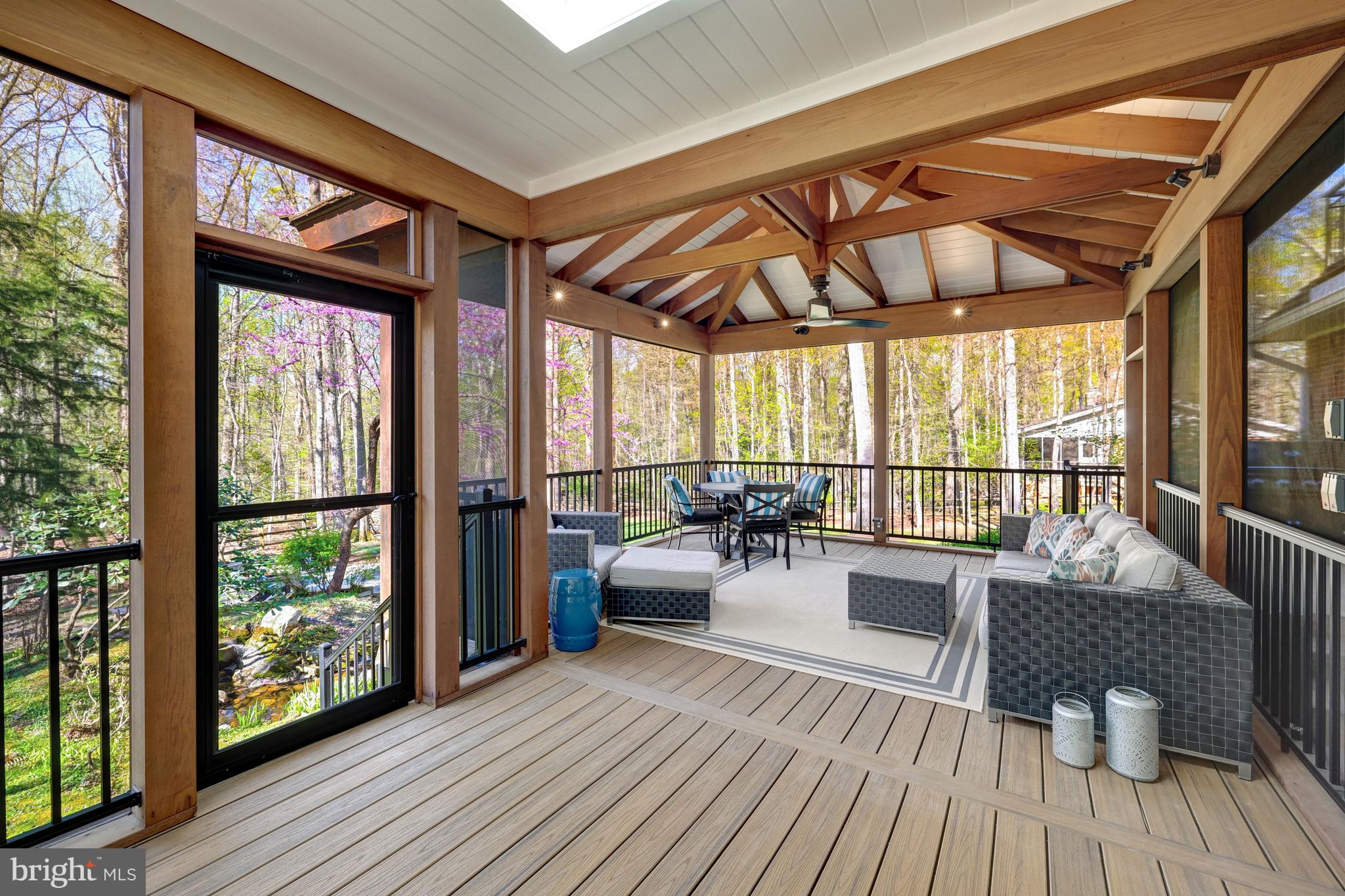 11809 State Rte 4707 Reston, VA 20191 - Photo 14 of 70 The screened-in porch has a door to the lawn.