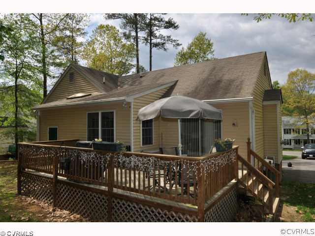 2525 Brookforest Road Midlothian, VA 23112 - Photo 11 of 11 a front view of house with yard outdoor seating and barbeque oven