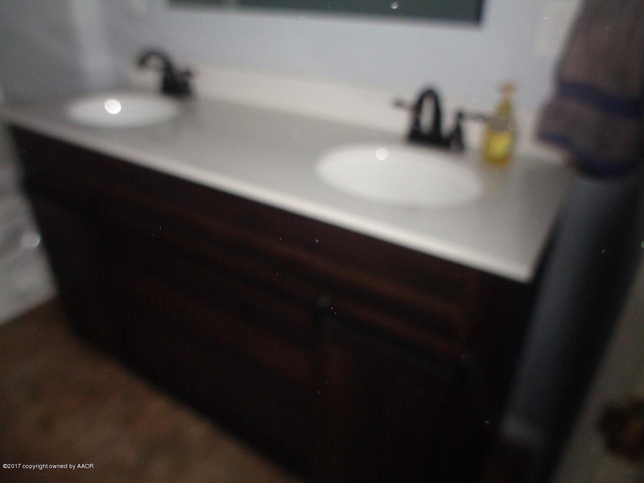 5101 Bowie Street Amarillo, TX 79110 - Photo 14 of 14 Bathroom Cabinetry