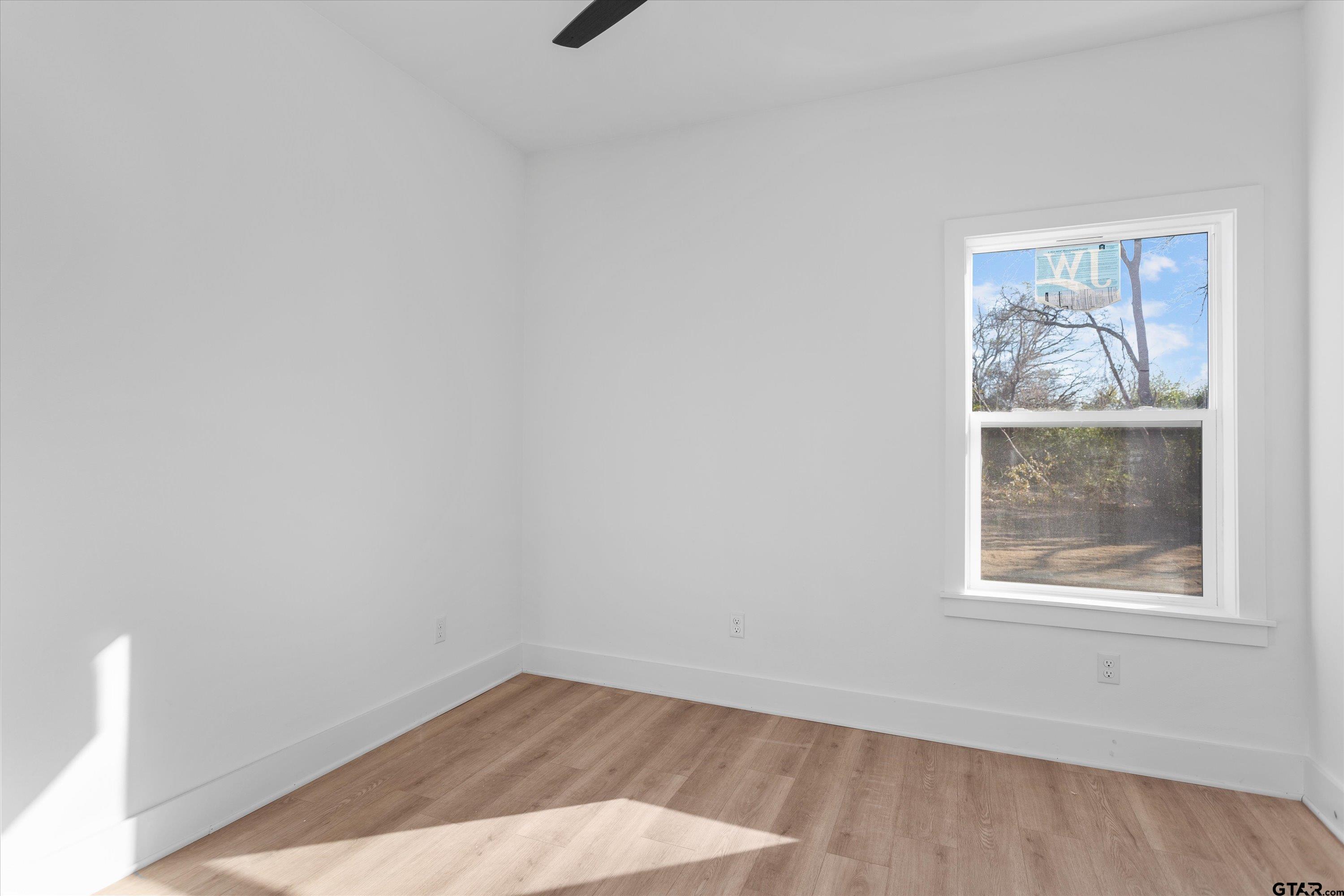 3026 Rose Tyler, TX 75701 - Photo 20 of 25 an empty room with a window