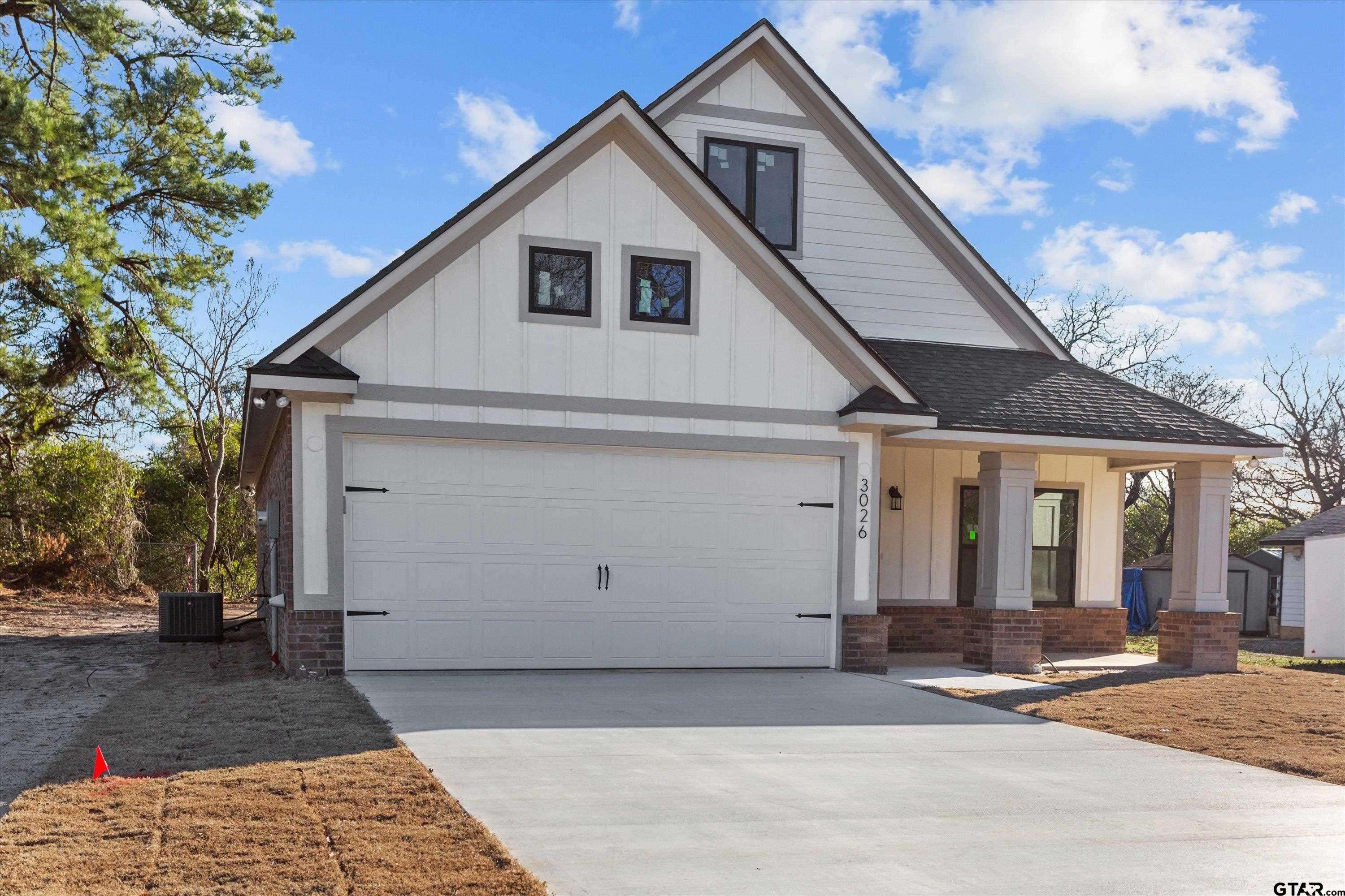 3026 Rose Tyler, TX 75701 - Photo 2 of 25 a view of a white house