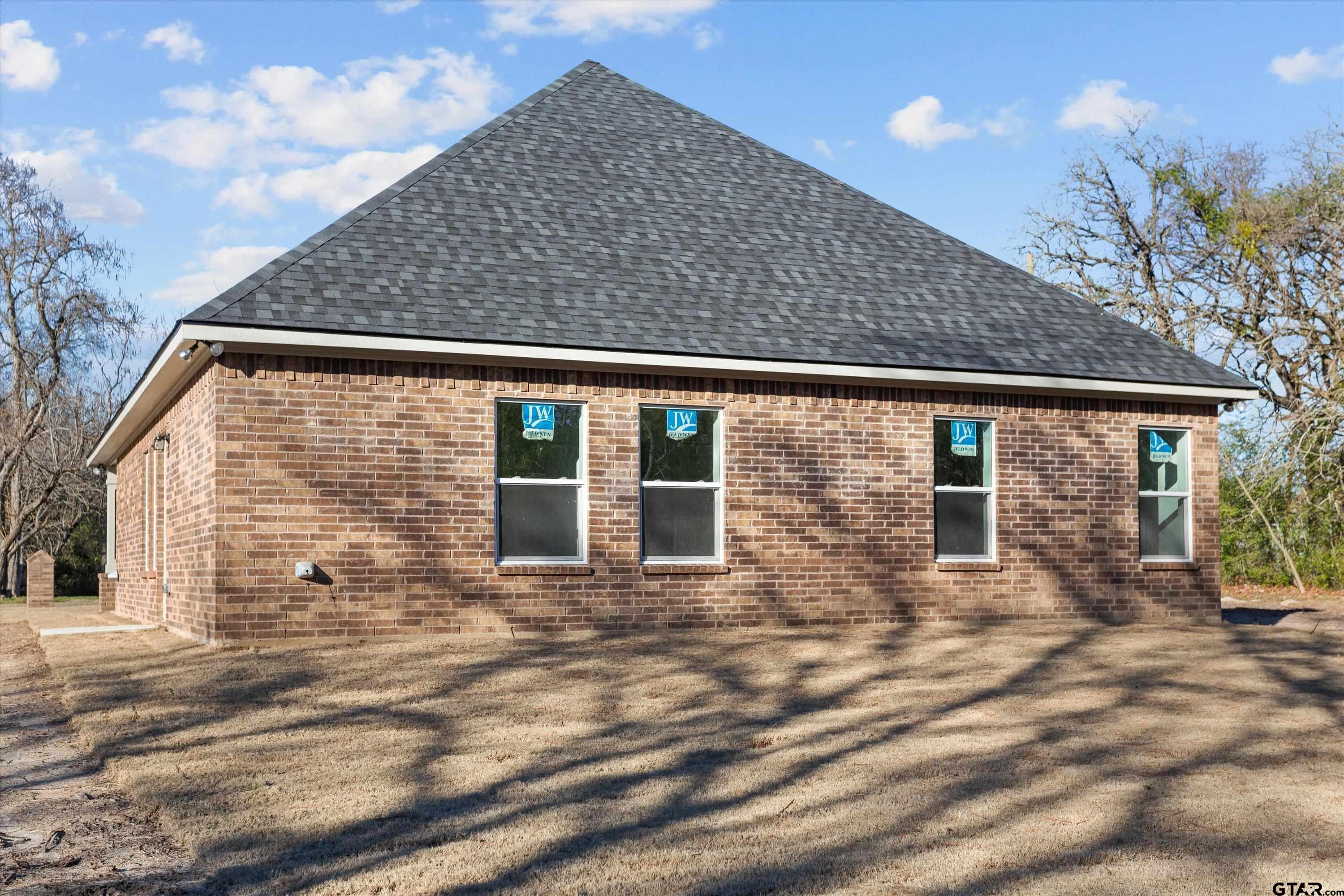 3026 Rose Tyler, TX 75701 - Photo 24 of 25 a front view of house with yard