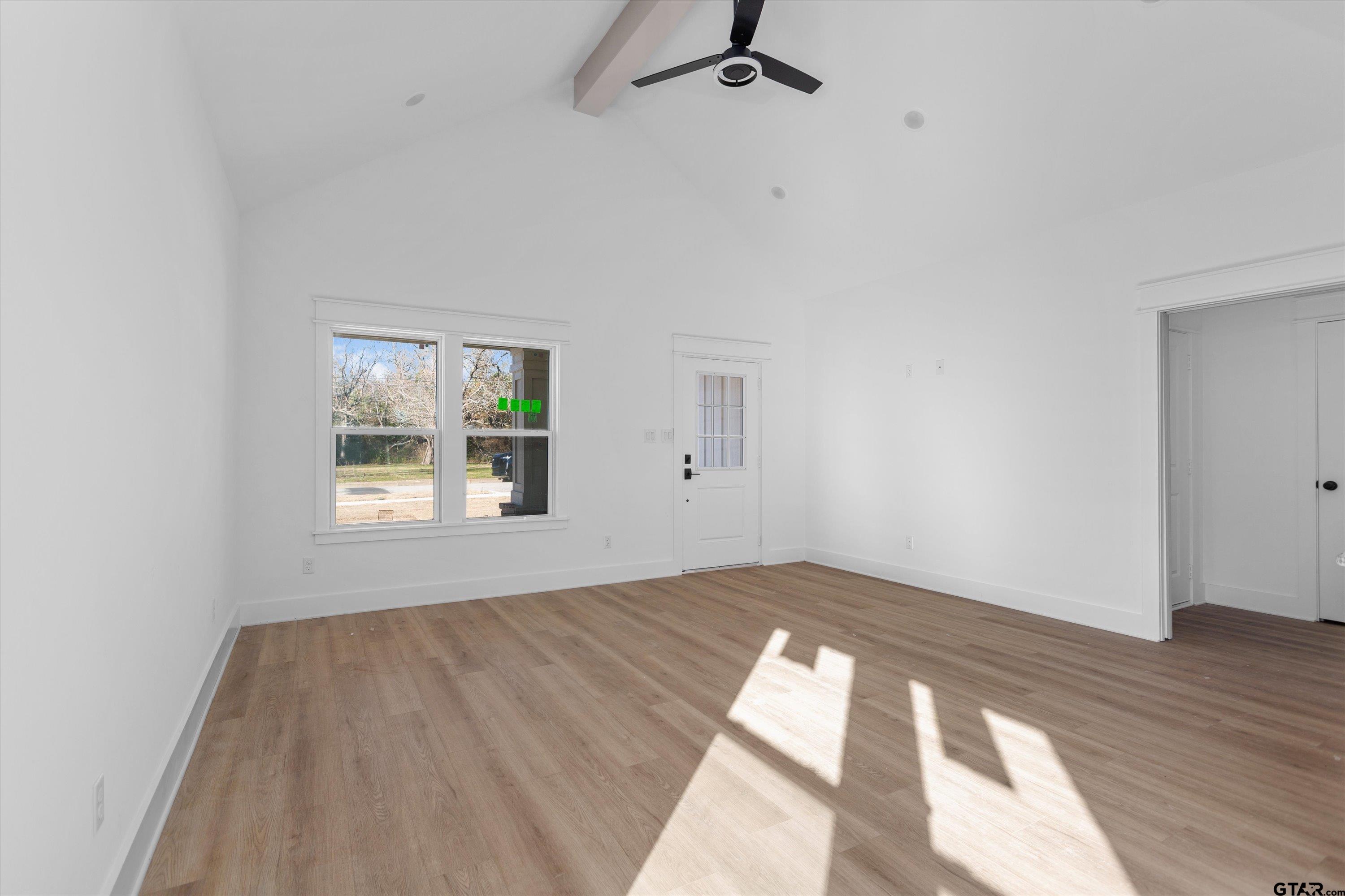 3026 Rose Tyler, TX 75701 - Photo 6 of 25 an empty room with windows
