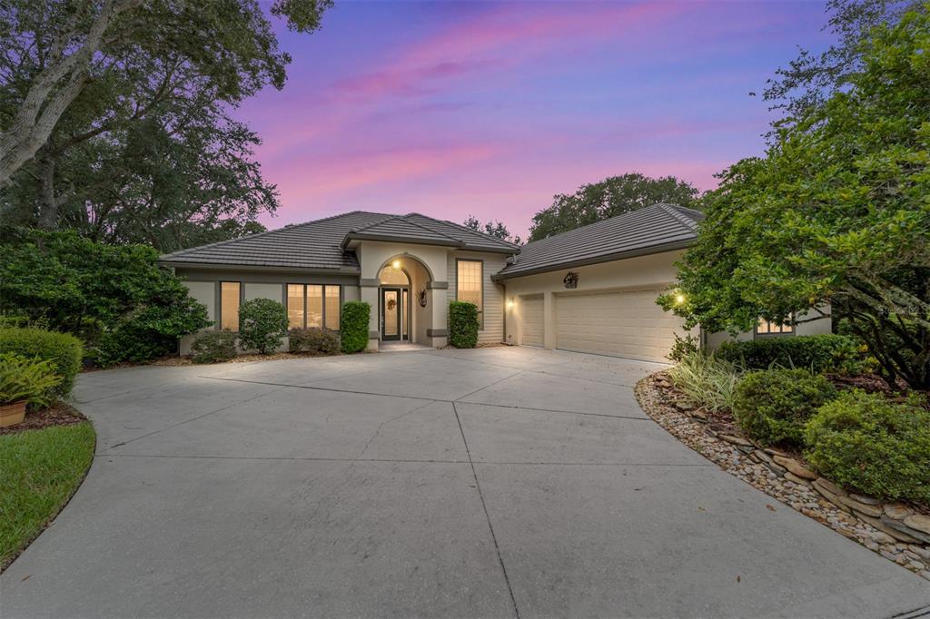 2834 North Prestwick Way Lecanto, FL 34461 - Photo 1 of 1 a front view of a house with garden
