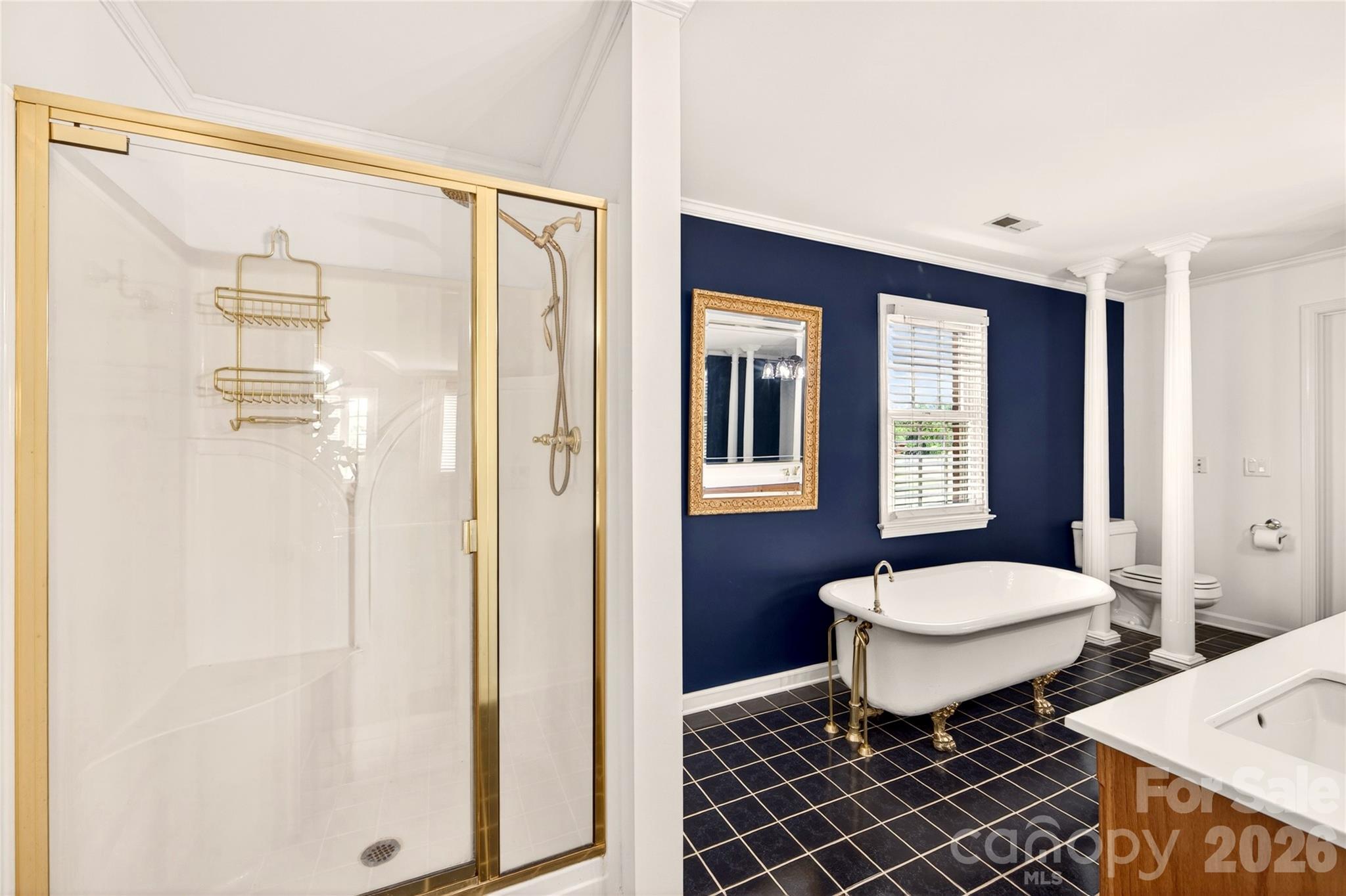 40659 Ridenhour Road Richfield, NC 28137 - Photo 17 of 25 a bathroom with a toilet sink a shower and a mirror