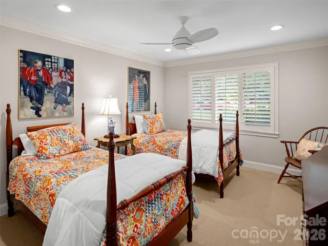 a bedroom with furniture and a bed