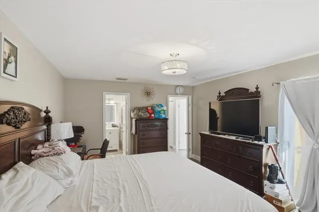 an aerial view of a house with yard swimming pool and outdoor seating