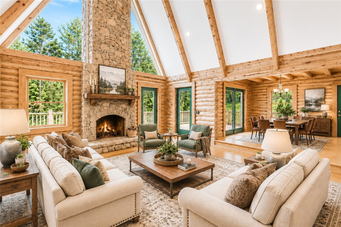 414 Devon Way Anderson, SC 29621 - Photo 7 of 50 A grand, naturally illuminated living area showcases a floor-to-ceiling stone fireplace and high vaulted ceilings.