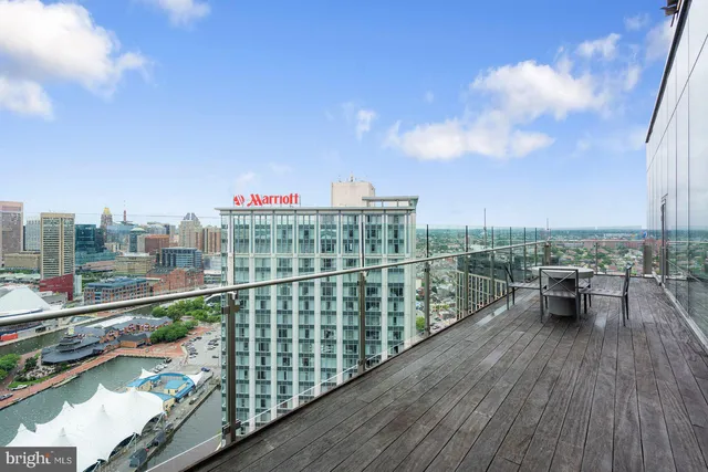 a view of city from terrace along with seating space