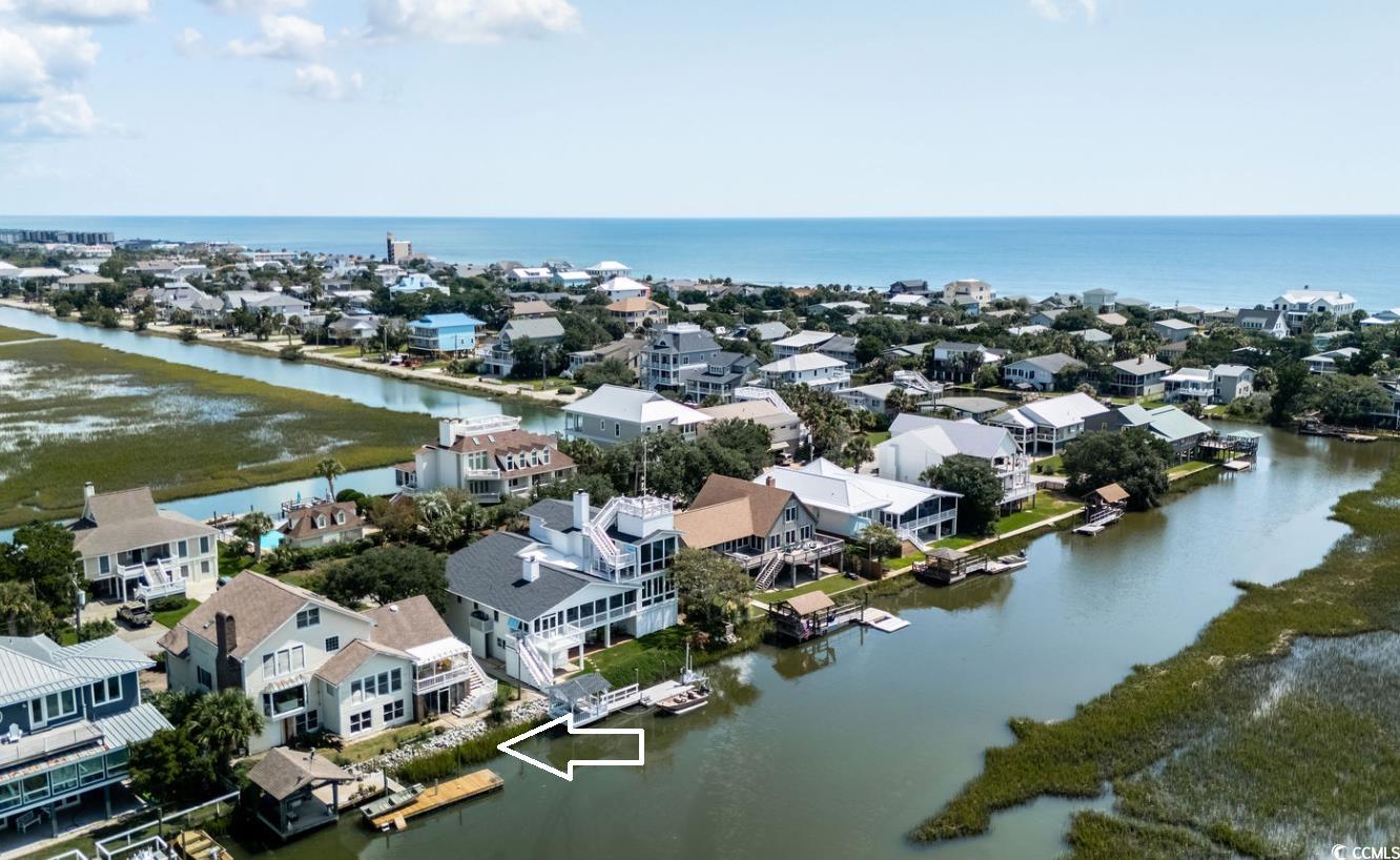 75 Marsh Hen Drive Pawleys Island, SC 29585 - Photo 6 of 26 Aerial perspective of suburban area featuring a large body of water
