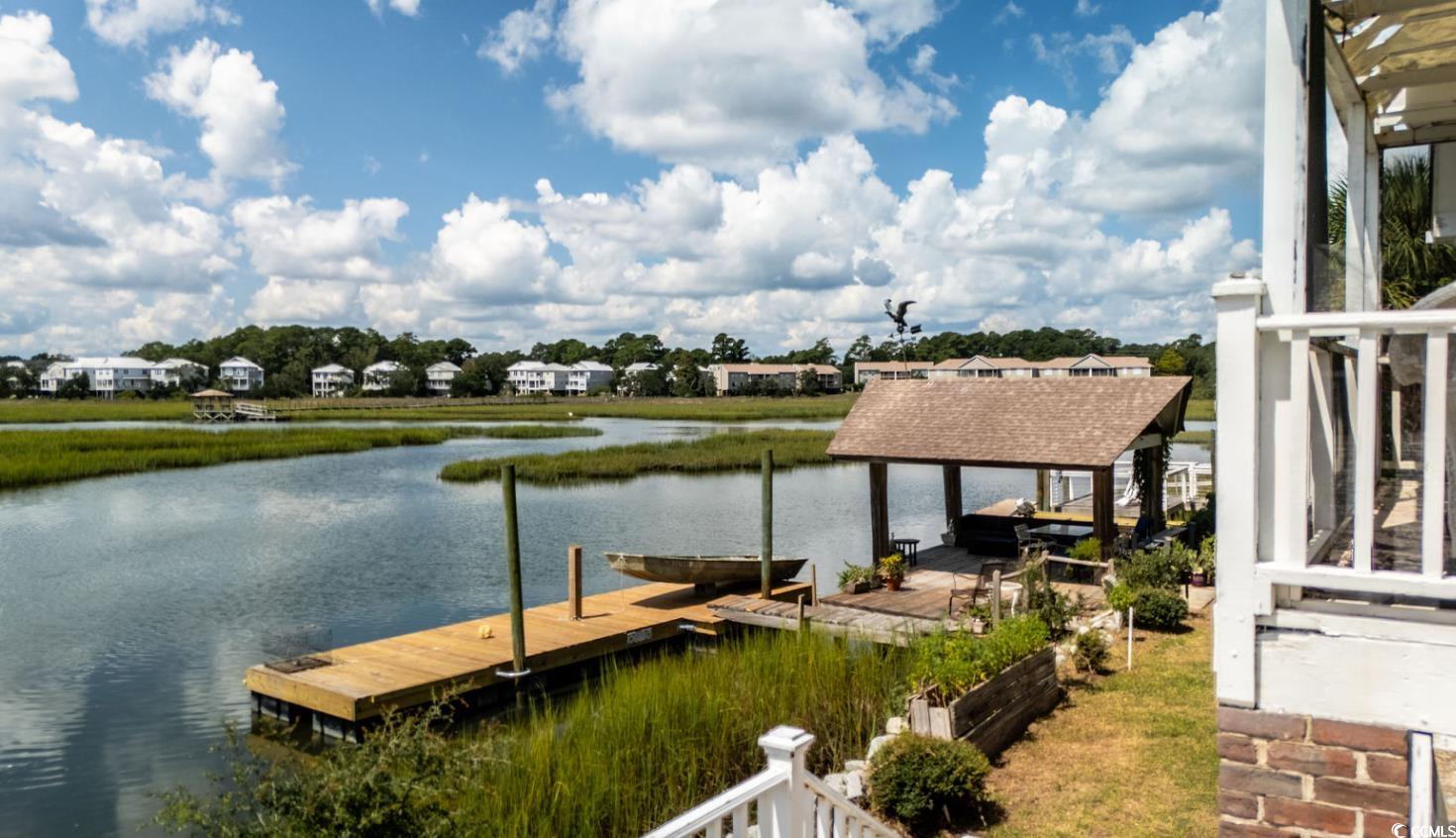 75 Marsh Hen Drive Pawleys Island, SC 29585 - Photo 8 of 26 Dock with a water view