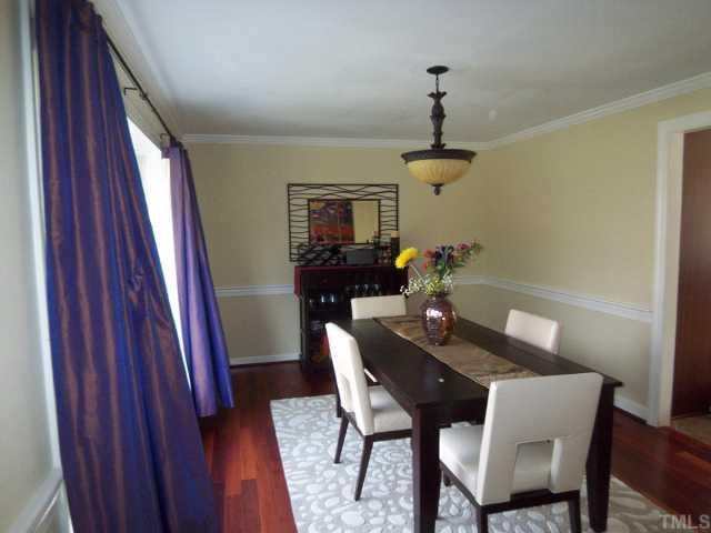 11605 Appaloosa Run West Raleigh, NC 27613 - Photo 7 of 12 a dining room with furniture and window