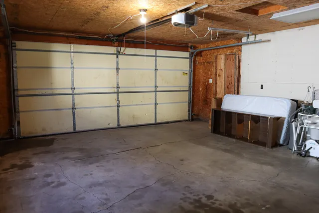 a view of a house with a wooden deck