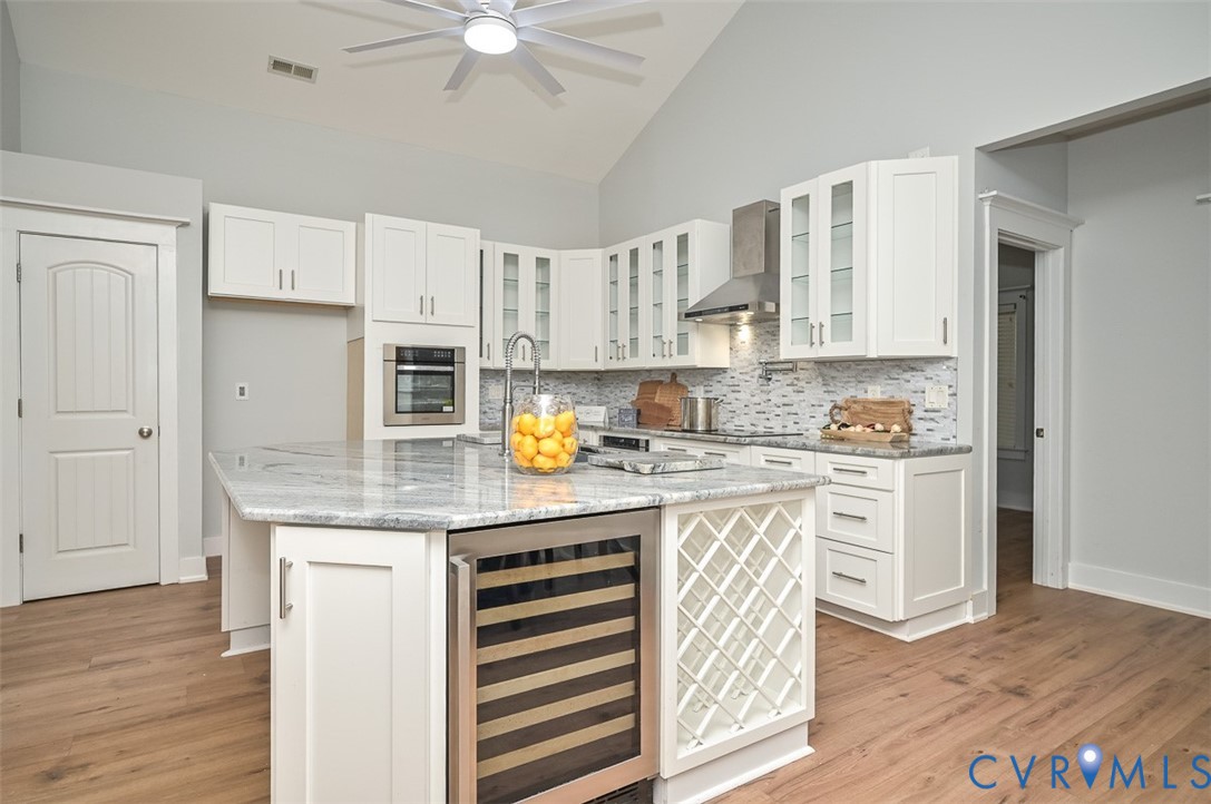 337 Shelton Place Aylett, VA 23009 - Photo 17 of 40 Kitchen with decorative backsplash, glass insert c