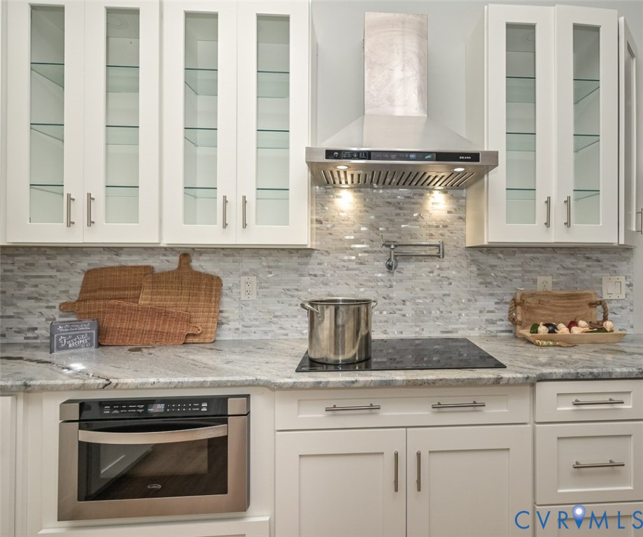 337 Shelton Place Aylett, VA 23009 - Photo 26 of 40 Kitchen featuring wall chimney exhaust hood, backs