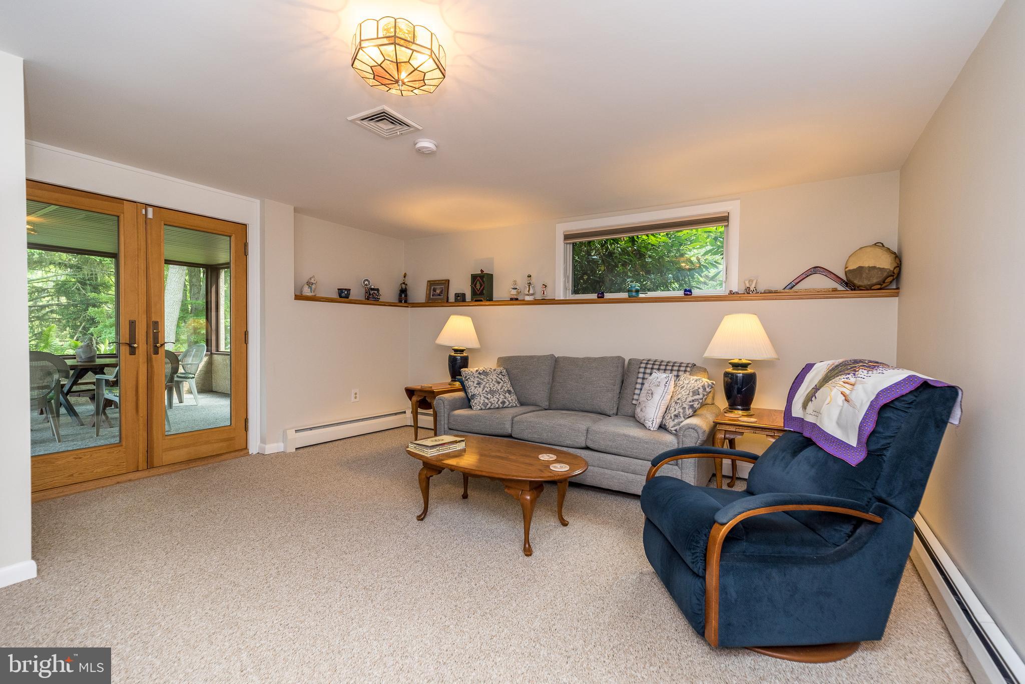 405 Gordon Road Ambler, PA 19002 - Photo 20 of 49 Family Room with Access to Screened Porch