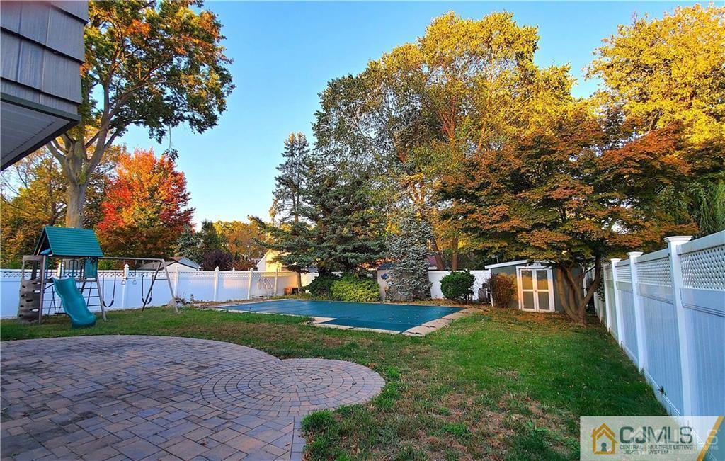 29 Finley Road Edison, NJ 08817 - Photo 4 of 18 a view of a house with a yard