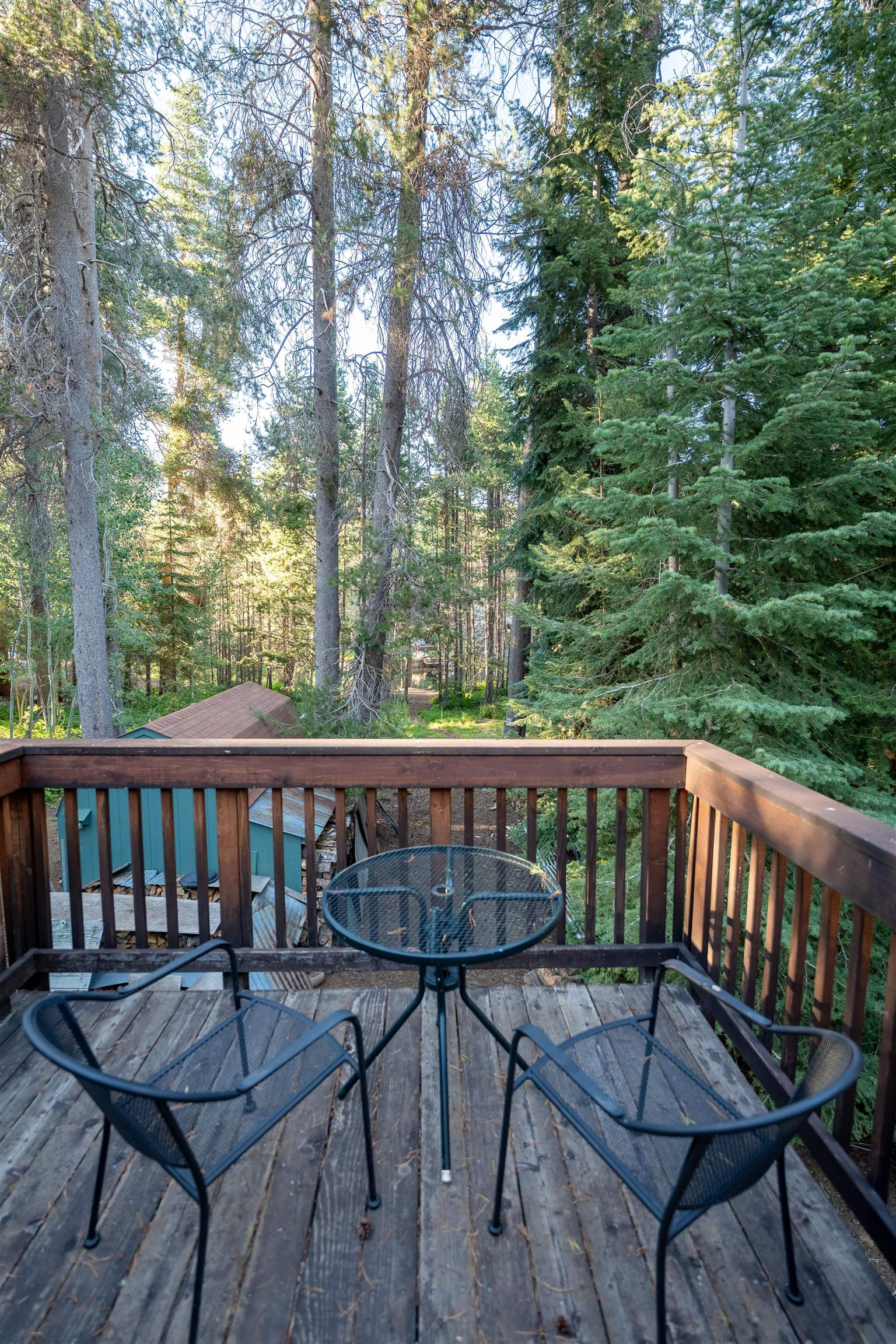 15790 Willow Street Truckee, CA 96161 - Photo 16 of 21 a view of a wooden deck and outdoor seating