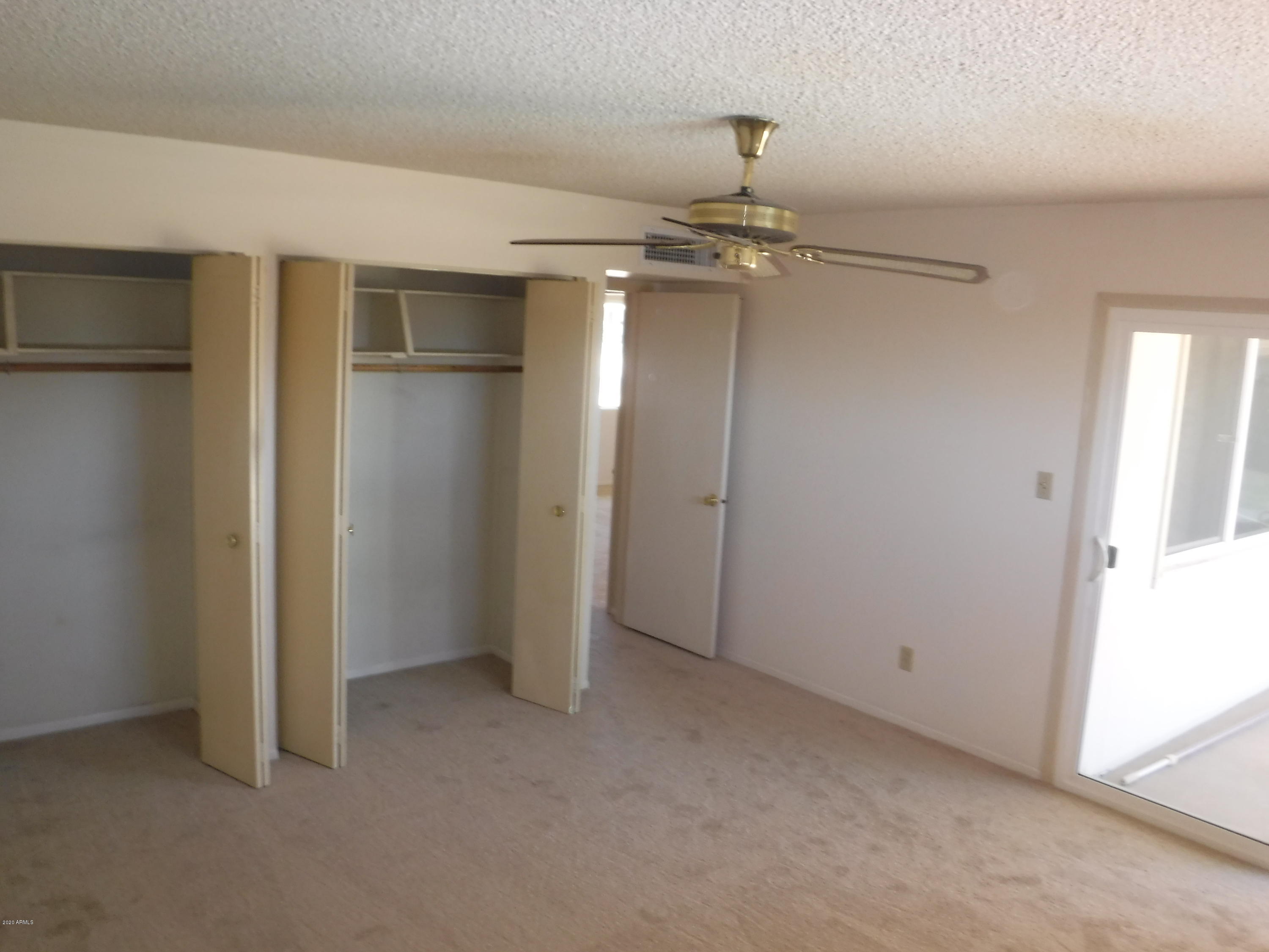 3117 West Calavar Road Phoenix, AZ 85053 - Photo 16 of 33 Master bedroom