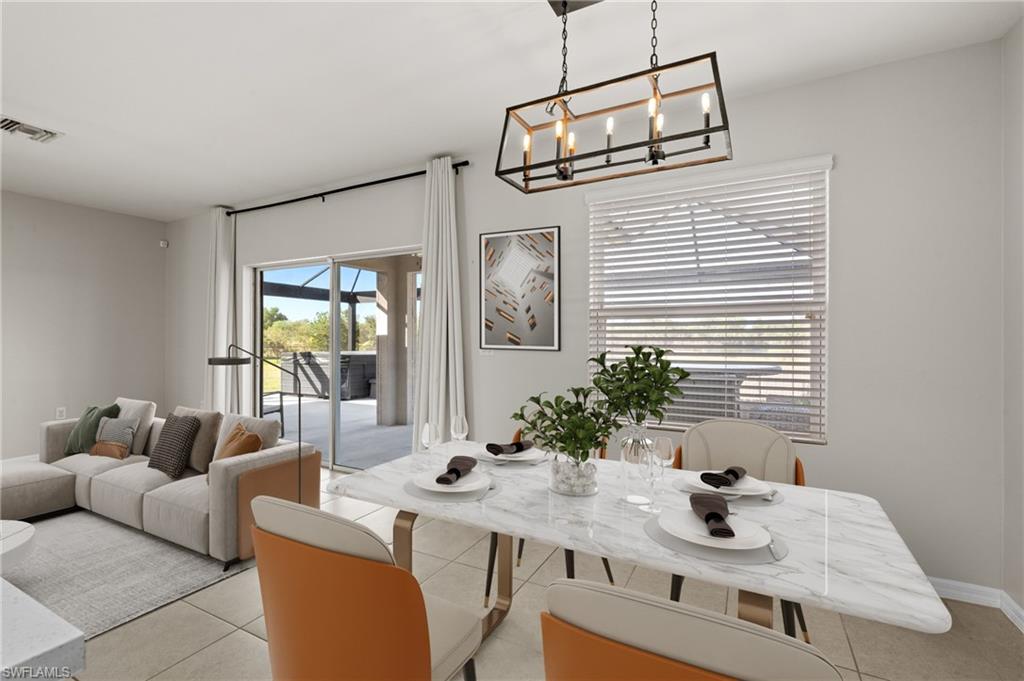 8149 Gopher Tortoise Trail Lehigh Acres, FL 33972 - Photo 12 of 50 a living room with furniture and window
