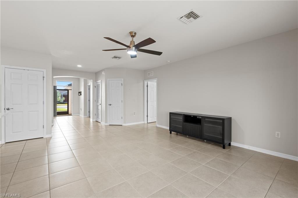 8149 Gopher Tortoise Trail Lehigh Acres, FL 33972 - Photo 14 of 50 a view of an empty room with a window