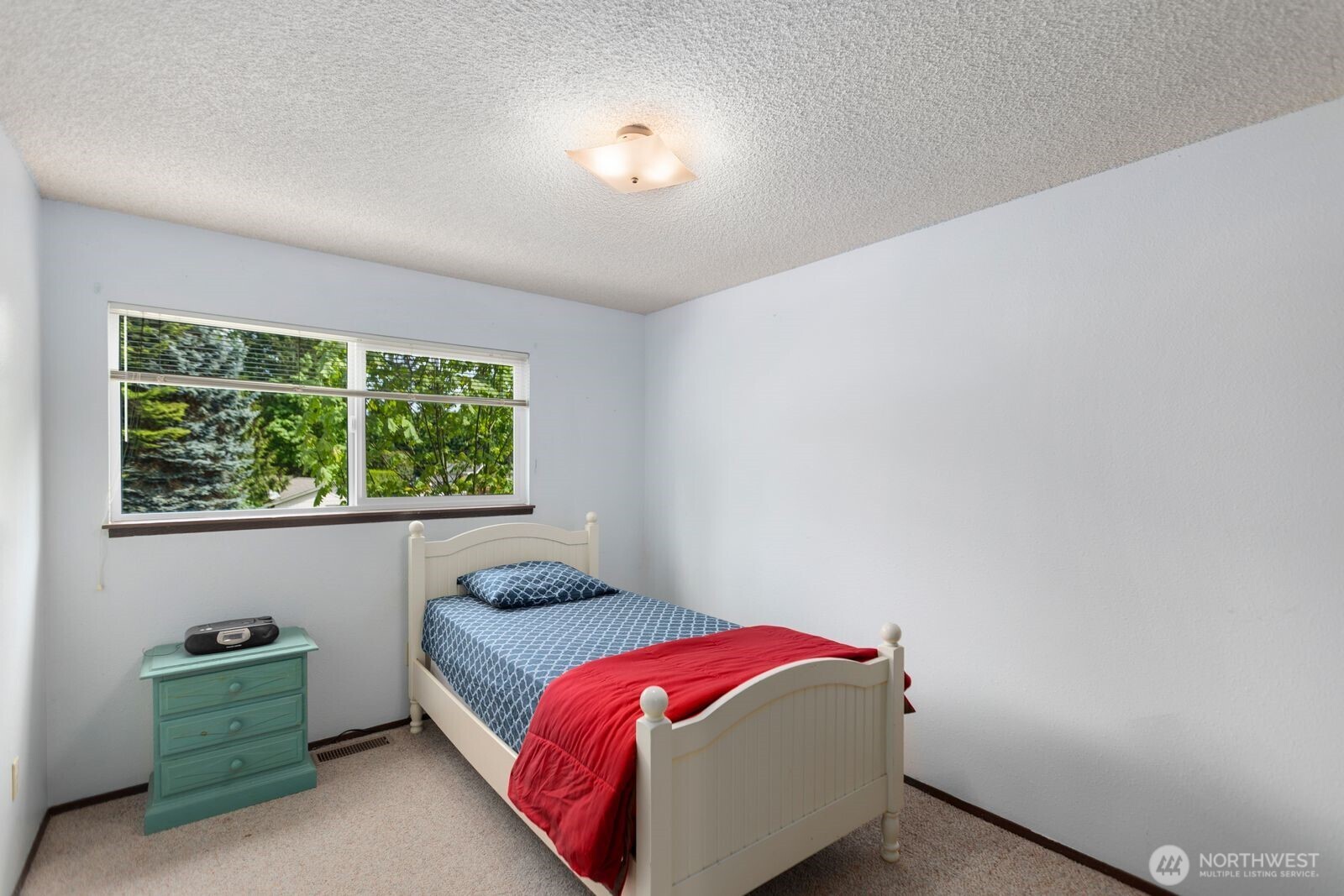 21627 9th Place West Bothell, WA 98021 - Photo 25 of 40 a bedroom with a bed and window