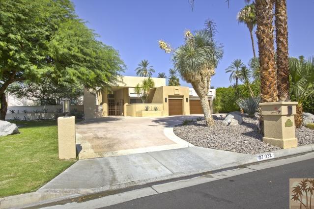 37232 Palm View Road Rancho Mirage, CA 92270 - Photo 1 of 25 a view of a white house with a yard and plants