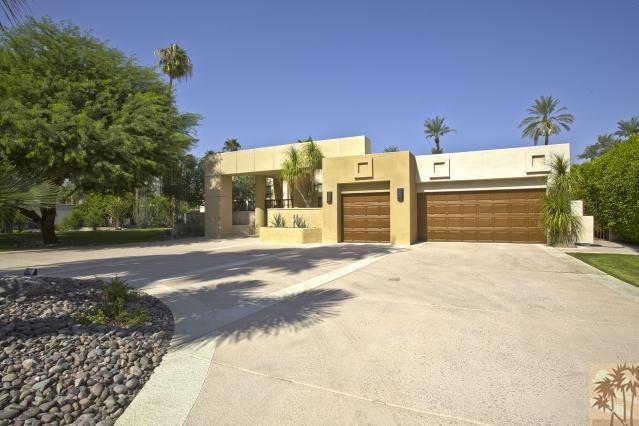 37232 Palm View Road Rancho Mirage, CA 92270 - Photo 2 of 25 a view of a house with a yard and garage