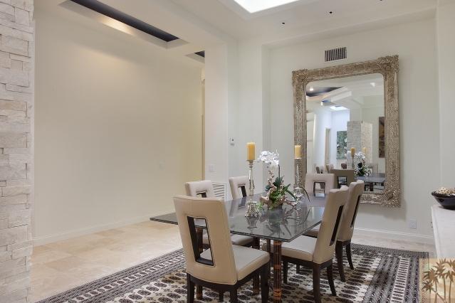 37232 Palm View Road Rancho Mirage, CA 92270 - Photo 11 of 25 a view of a dining room with furniture and wooden floor